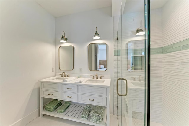 bathroom with tile patterned flooring, vanity, and an enclosed shower