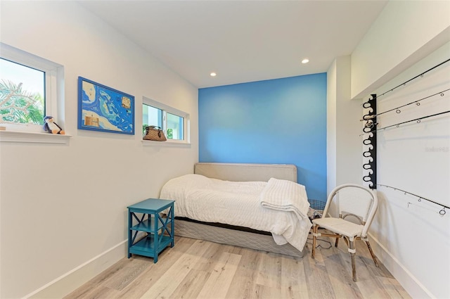 bedroom featuring light hardwood / wood-style floors