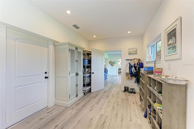 hallway featuring light hardwood / wood-style flooring