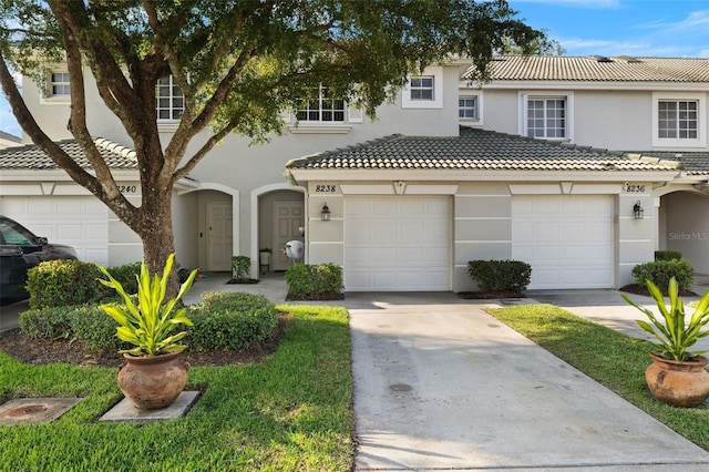 view of front of home with a garage