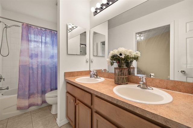 full bathroom featuring toilet, shower / bath combo, vanity, and tile patterned floors