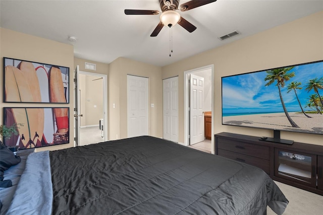 bedroom featuring ceiling fan and light colored carpet