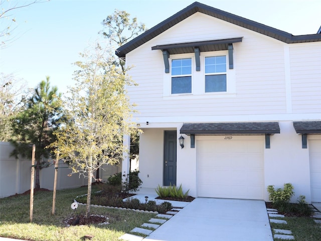 view of front of house with a garage