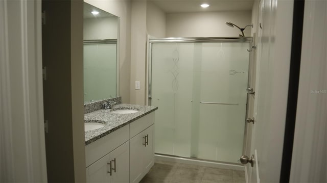 bathroom featuring vanity and walk in shower