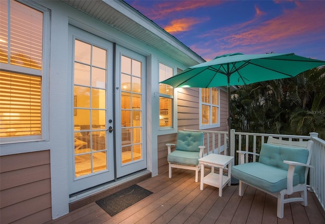 deck at dusk with french doors