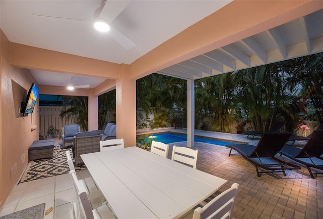 view of patio featuring ceiling fan