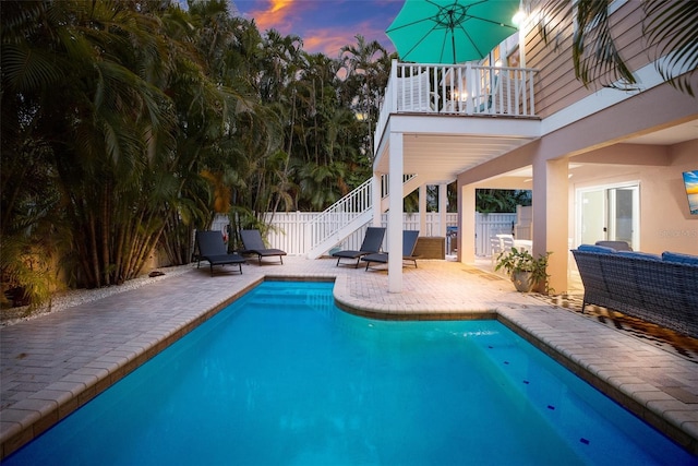 view of pool featuring a patio