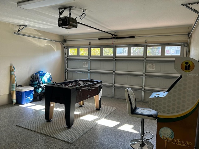 garage featuring a garage door opener