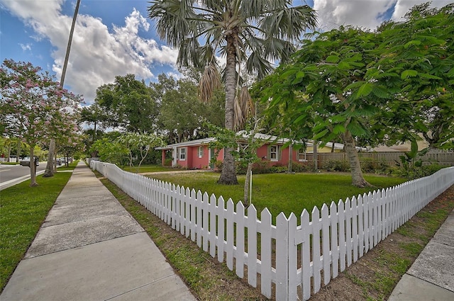 view of front of home with a front lawn