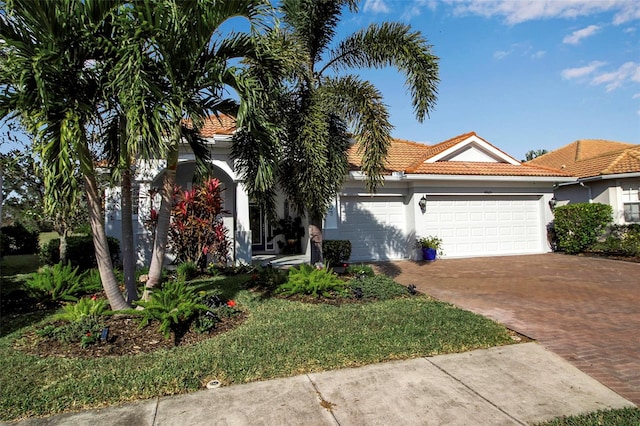 view of front of property with a garage