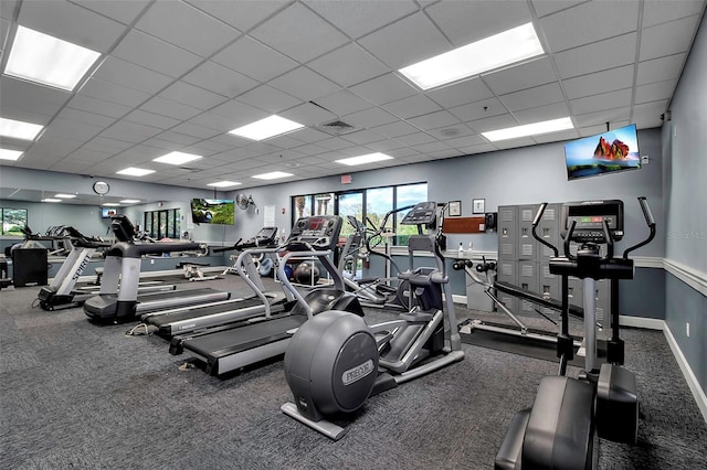 gym featuring a drop ceiling