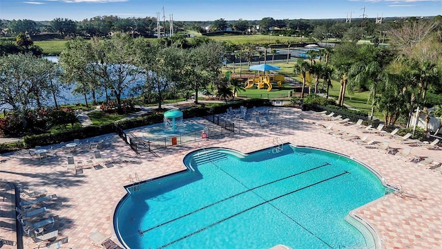 view of swimming pool with a patio