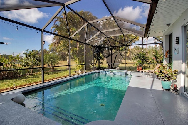 view of swimming pool with glass enclosure and a patio