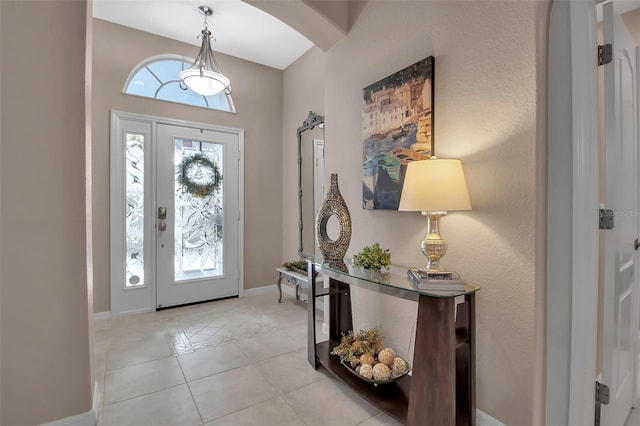 entrance foyer featuring light tile patterned floors