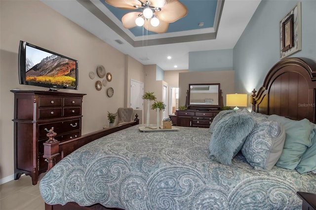 bedroom with a raised ceiling