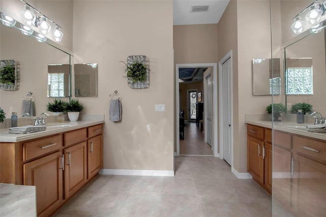 bathroom featuring tile patterned floors and vanity