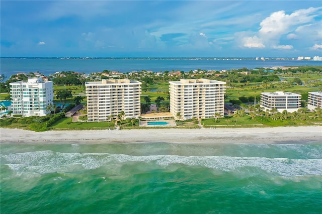 aerial view with a beach view and a water view