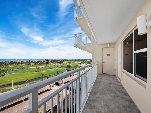 balcony featuring a water view