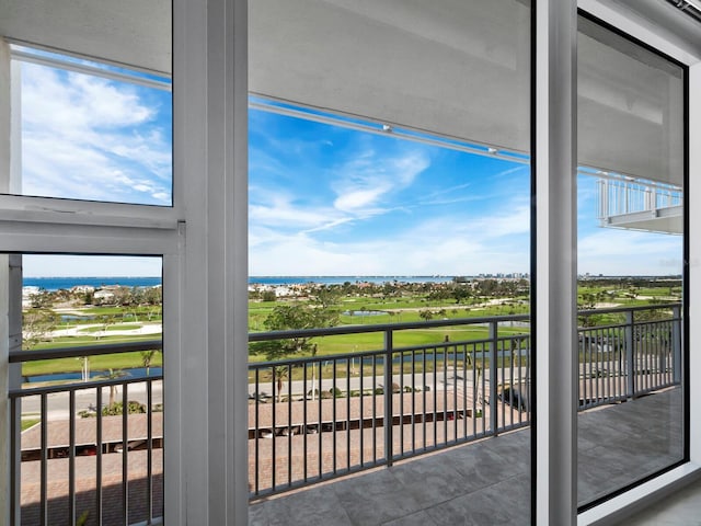 balcony featuring a water view