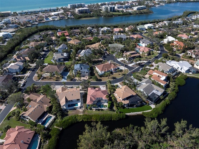 bird's eye view with a water view