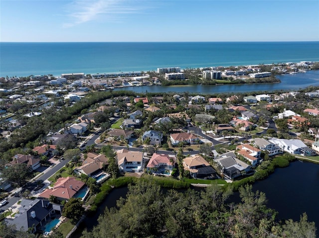 drone / aerial view with a water view