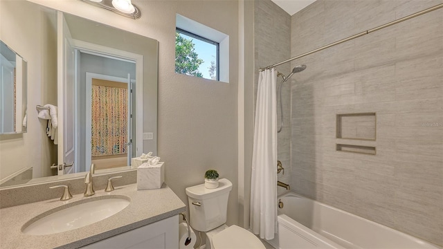 full bathroom featuring vanity, toilet, and shower / bath combo with shower curtain