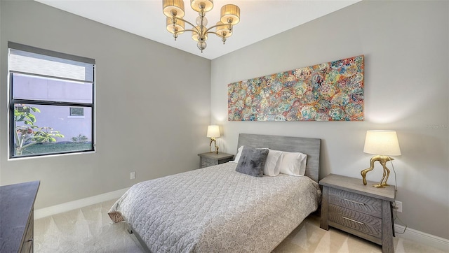 carpeted bedroom with a chandelier