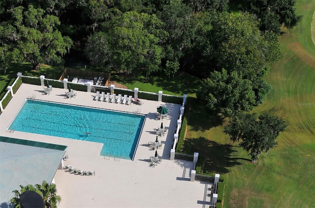 view of swimming pool featuring a patio