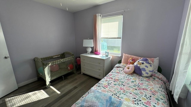 bedroom featuring dark hardwood / wood-style floors