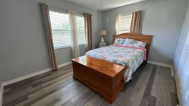 bedroom featuring dark wood-type flooring