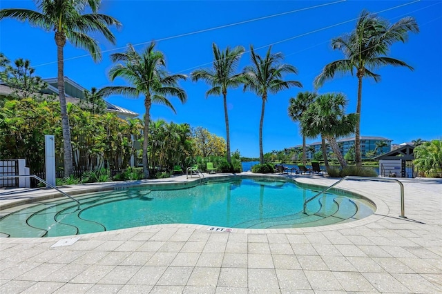 view of swimming pool featuring a patio area