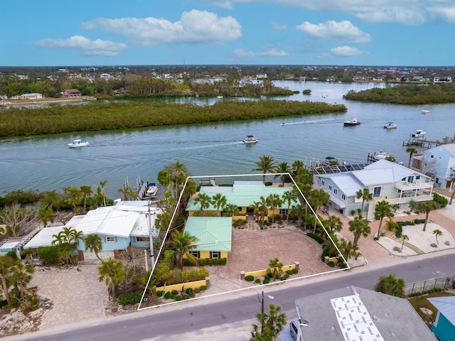 drone / aerial view with a water view