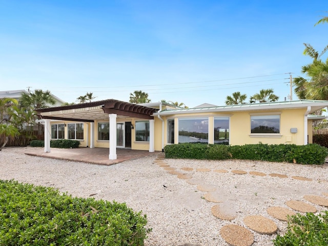 rear view of property with a patio