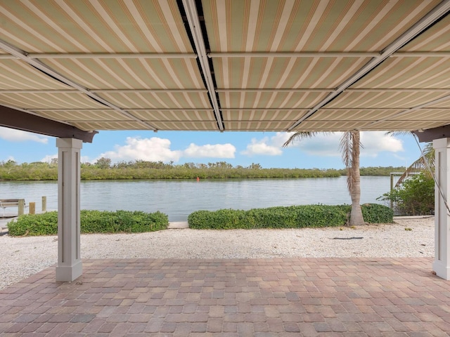 view of patio / terrace featuring a water view