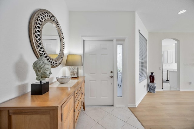 foyer with light hardwood / wood-style flooring