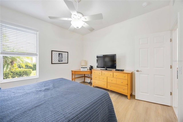 bedroom featuring light hardwood / wood-style floors and ceiling fan