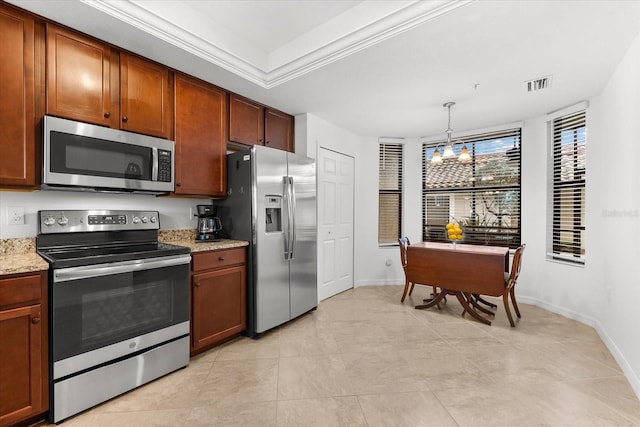 kitchen with pendant lighting, crown molding, light stone countertops, appliances with stainless steel finishes, and a chandelier