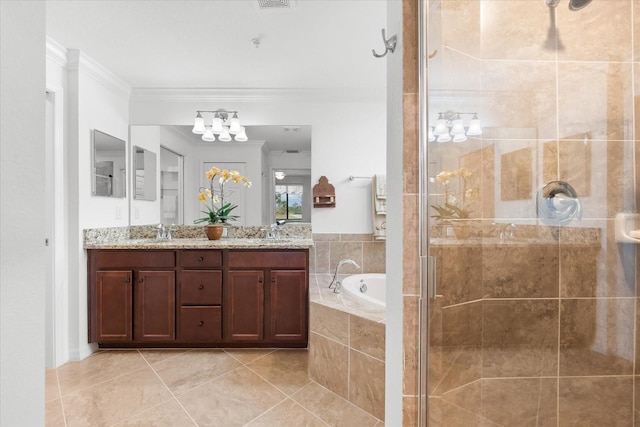 bathroom with plus walk in shower, ornamental molding, tile patterned floors, and vanity