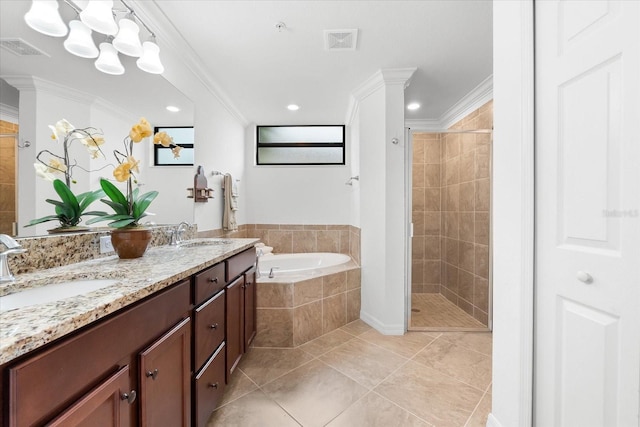 bathroom with ornamental molding and shower with separate bathtub