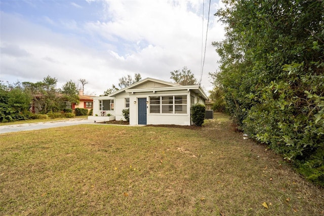 ranch-style house with a front yard