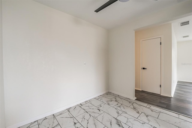 unfurnished room featuring ceiling fan