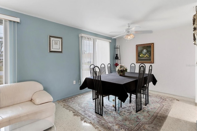 dining room with ceiling fan