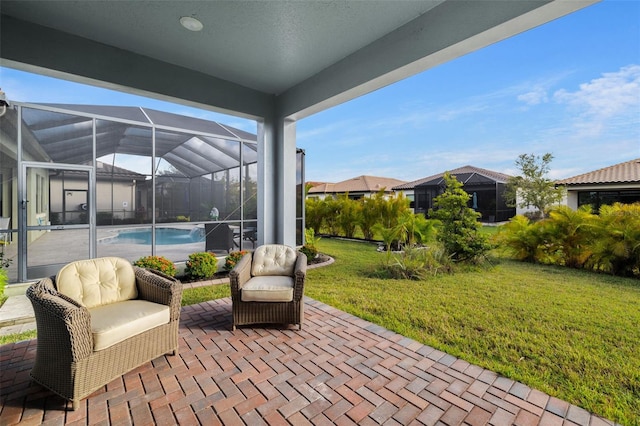 view of patio / terrace with glass enclosure