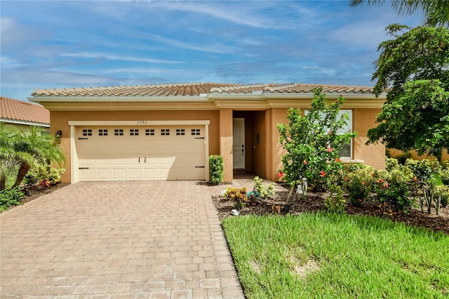 view of front of home with a garage