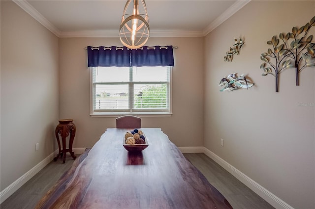 dining space with crown molding and dark wood-type flooring