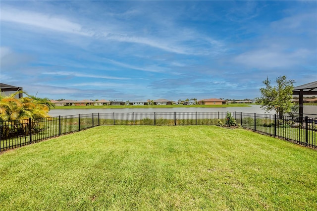 view of yard with a water view