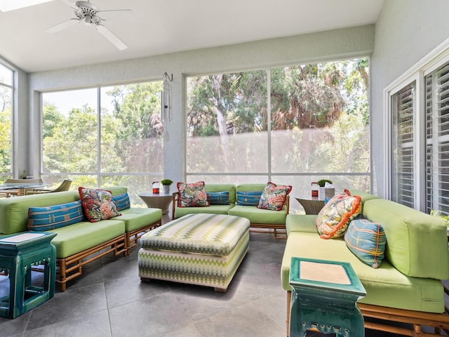 sunroom / solarium with plenty of natural light and ceiling fan