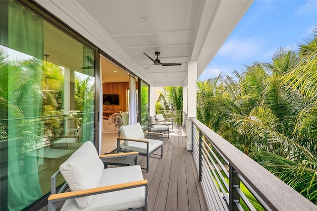 wooden deck with ceiling fan