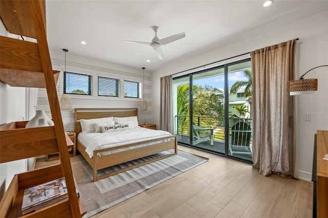 bedroom with ceiling fan, light hardwood / wood-style floors, and access to outside