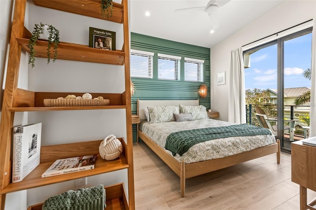 bedroom with access to exterior, light hardwood / wood-style flooring, and ceiling fan